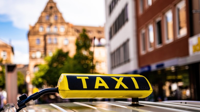taxi sign in an old city
