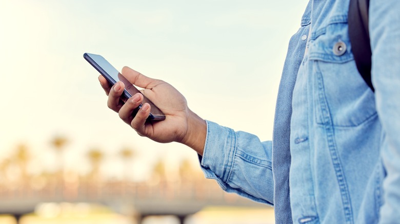 Person holding a phone