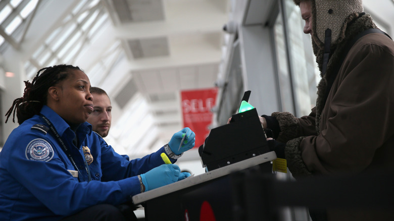 TSA agents checking identification