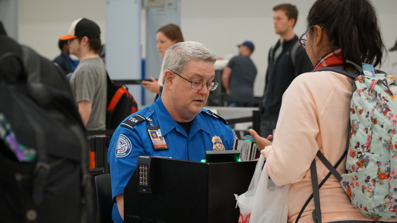 Person speaking to TSA