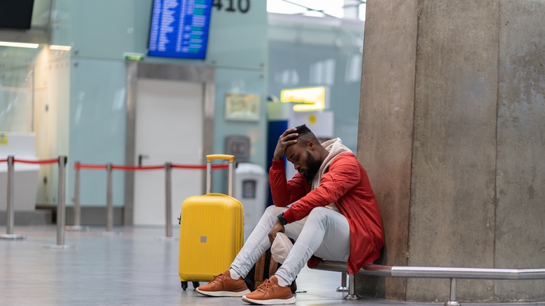 Young man waiting for flight