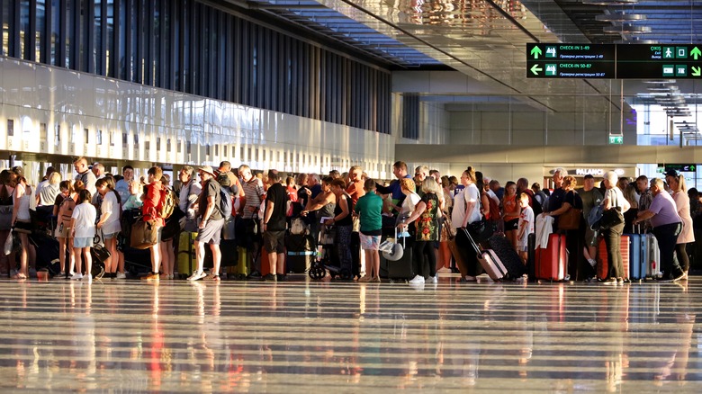 Passengers waiting to check in