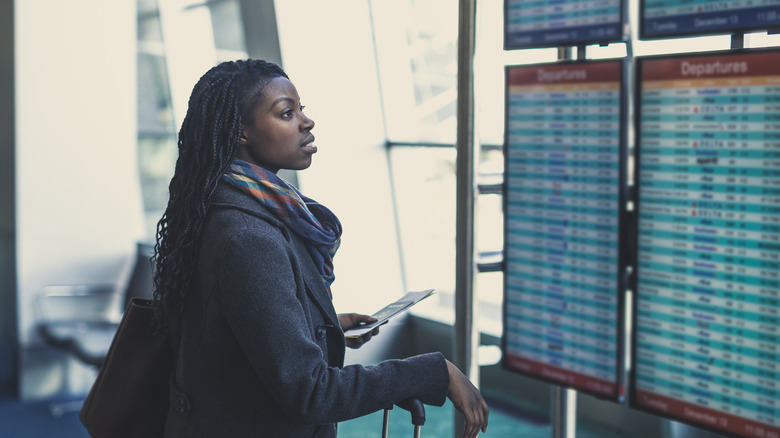 Departures monitor at an airport