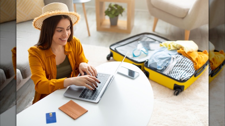 woman planning sunny vacation