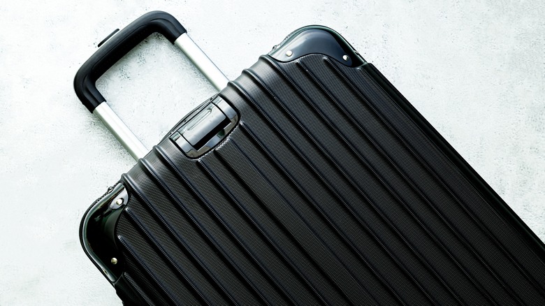 black luggage with hard case