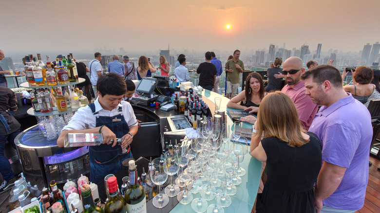 Busy rooftop bar in Bangkok