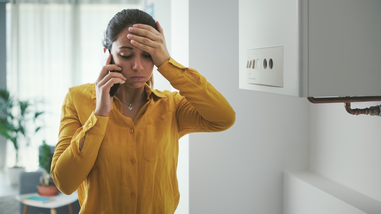 woman calling emergency assistance