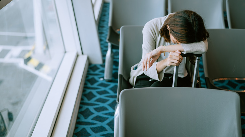 woman waiting in airport