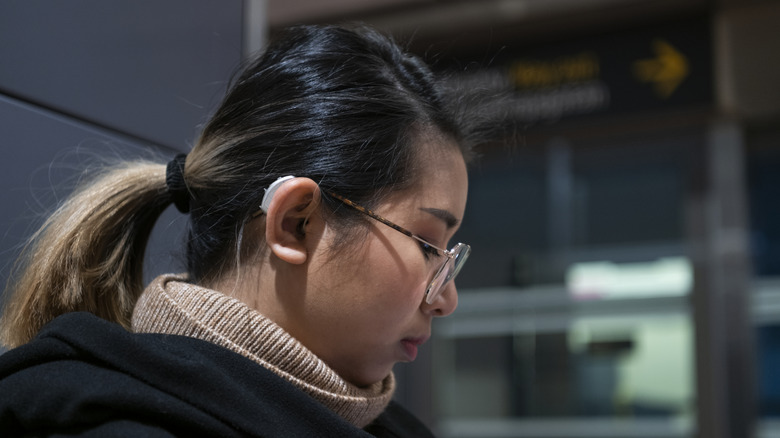 Closeup of woman's hearing aids