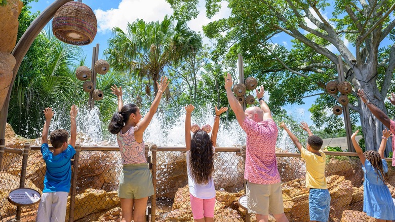 family at Moana water feature