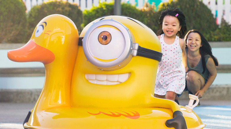 Girl with Minion ducky ride