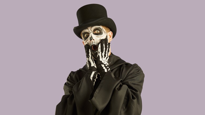 person dressed as skeleton