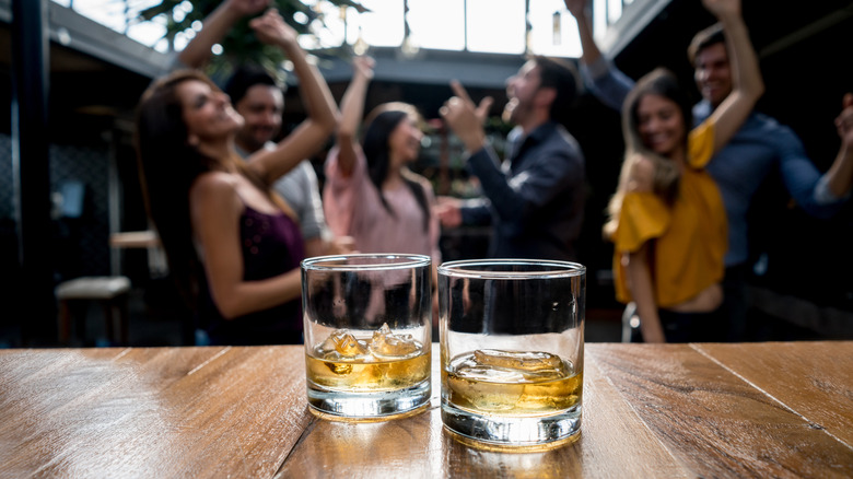 people dancing at bar 