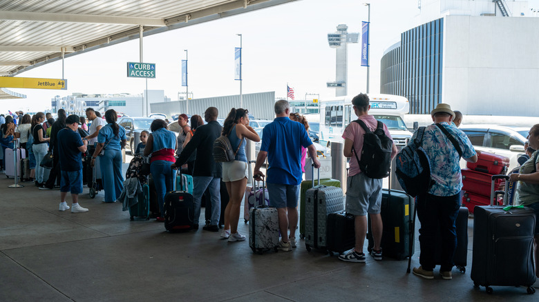 Long check-in queues at airport