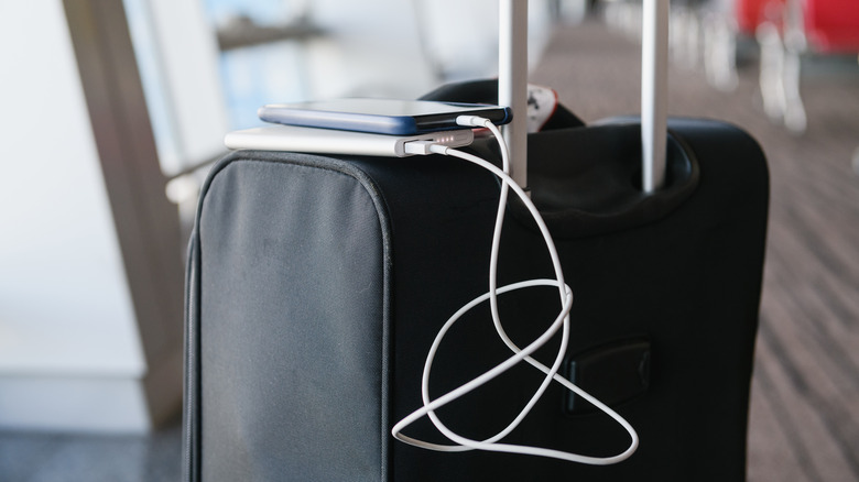 cellphone external battery on luggage