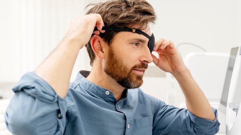 man wearing eye patch