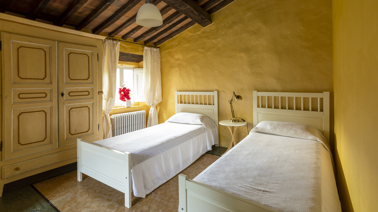 Two single beds in pensione room