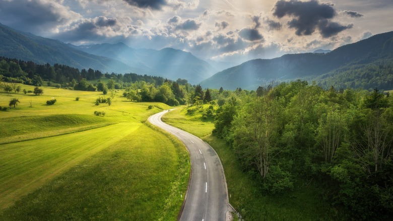 road through European landscape