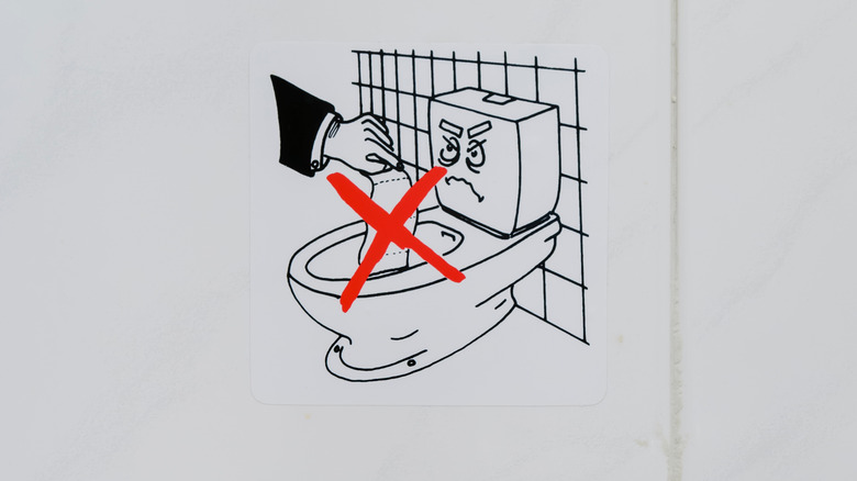 Don't flush toilet paper cartoon