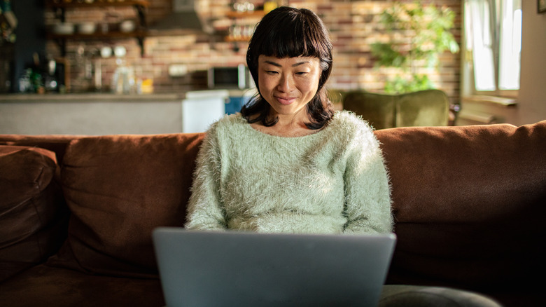 Woman using laptop