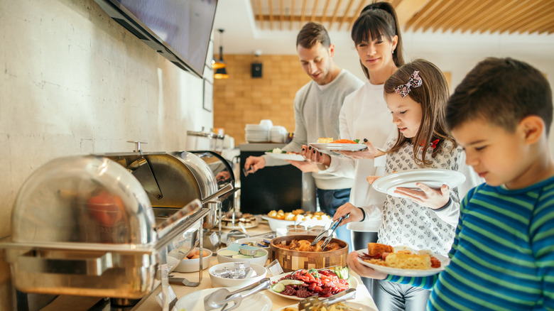 Family at breakfast buffet