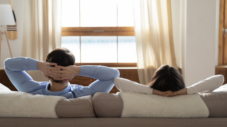 Couple relaxing on a sofa