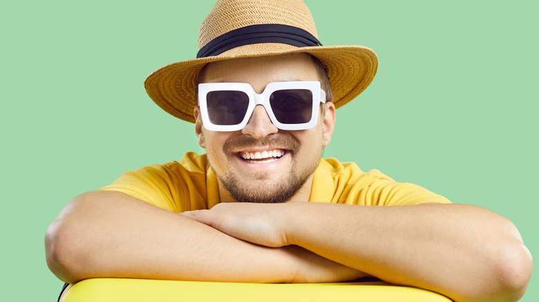 man in hat and sunglasses
