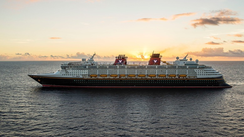 Disney Magic sailing at sunset