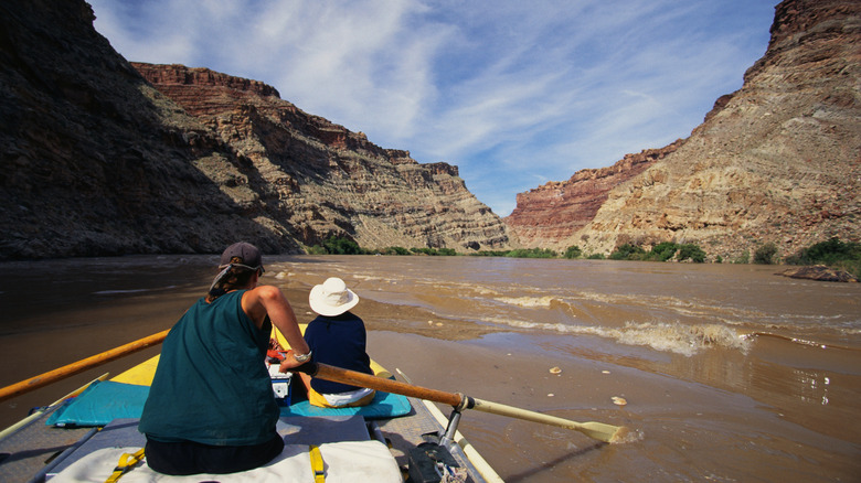 Couple rafting in Cataract Canyon