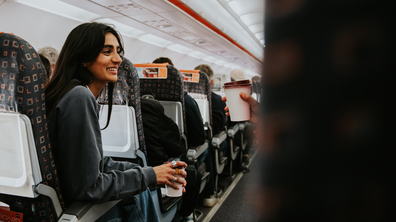 Smiling airplane passenger