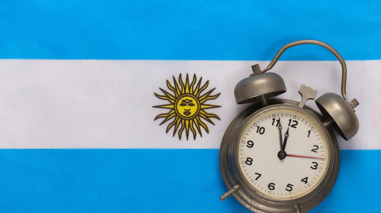 clock on an Argentina flag