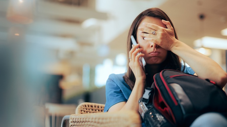 frustrated woman on phone