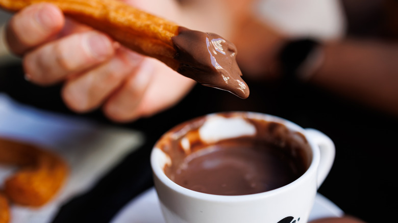 Churros dipped in hot chocolate