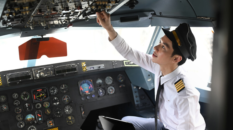 Airplane pilot in the cockpit