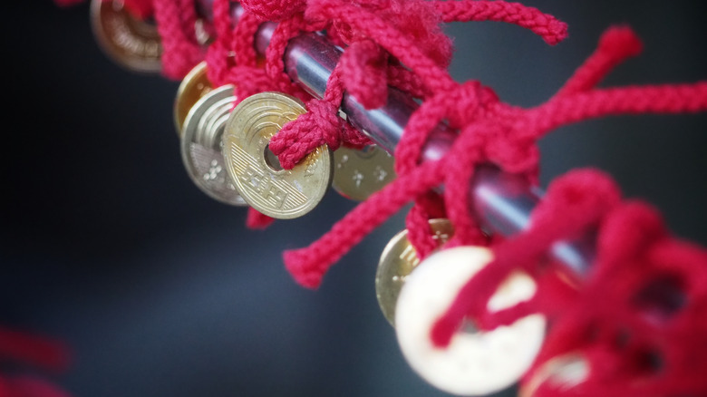 Five yen coins presented for luck at a shrine