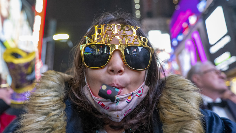 child celebrating New Year's Eve