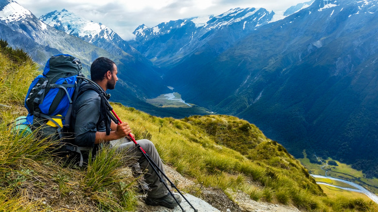 Hiker admiring a mountainous view