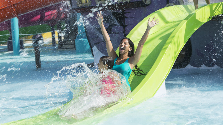 Woman and child at water park