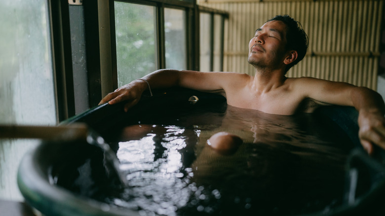 Man relaxing in an onsen