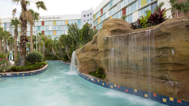 Universal hotel pool with waterfall