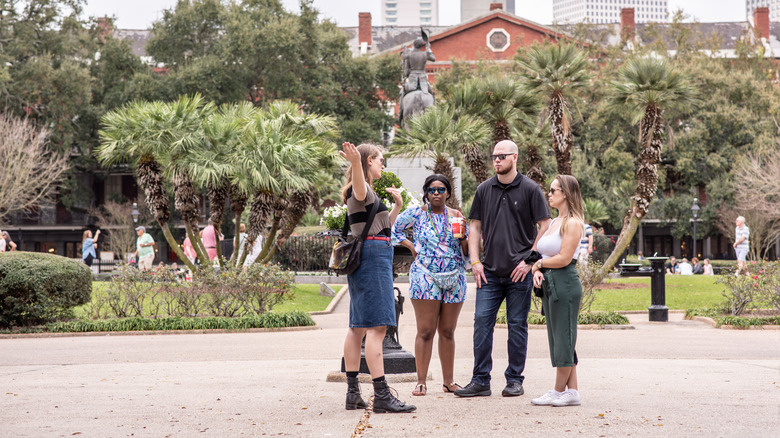 Tour guide with tourists