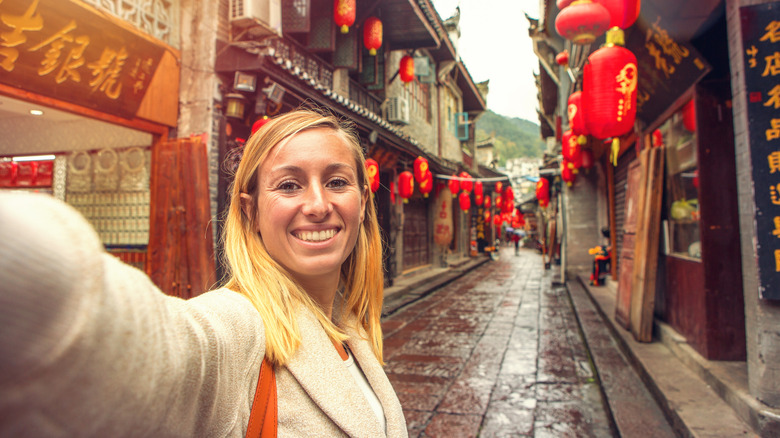 tourist taking selfie in China