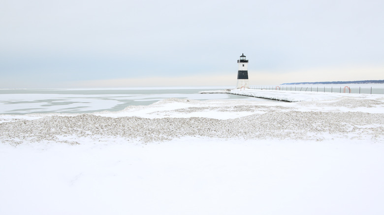 Lighthouse snowy dunes