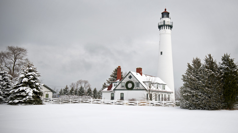 Winter landscape white lighthouse