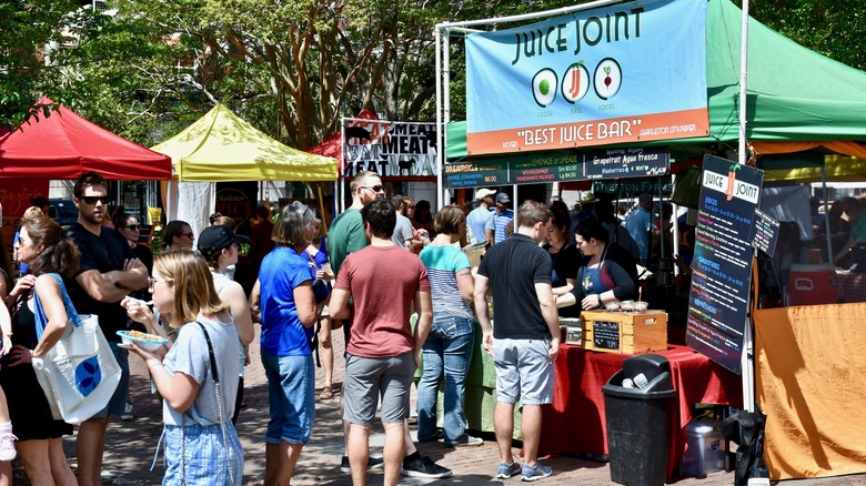 People shopping farmers market