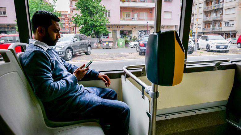 Rome bus passenger and machine