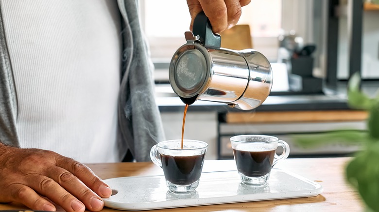 Pouring coffee from a moka pot