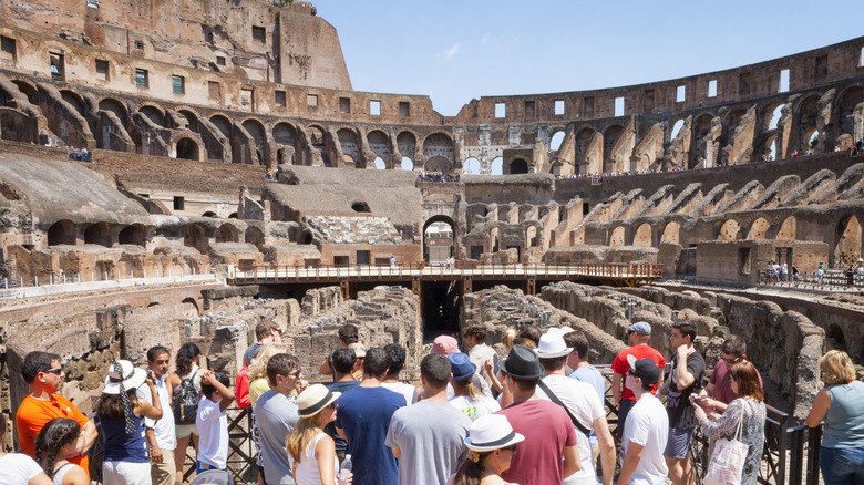 Visitor crowds inside the Colosseum