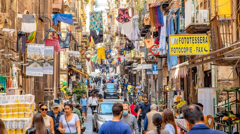 Busy street with hanging laundry