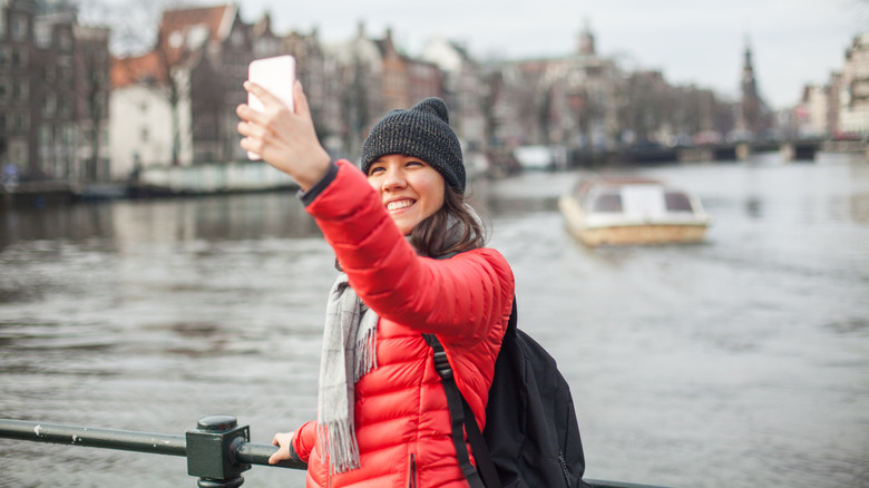 woman taking photo in Amsterdam